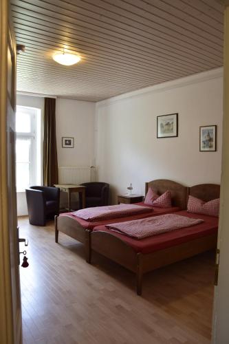 Säng eller sängar i ett rum på Gästezimmer „Hühnerwiese“