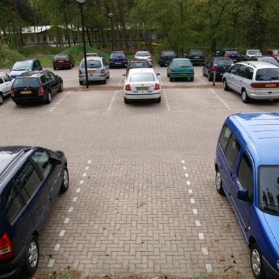 a bunch of cars parked in a parking lot at Landgoed ISVW in Leusden