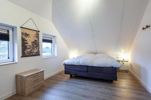 Postel nebo postele na pokoji v ubytování Noordwijk Holiday Rentals