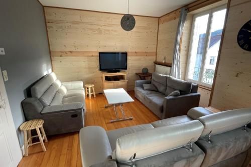 Posezení v ubytování Bright nest with mountain view in Gérardmer