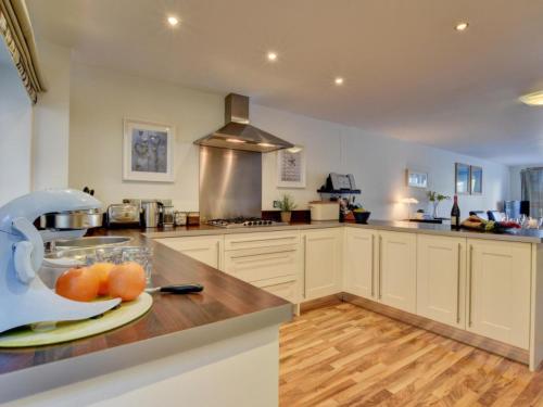 a kitchen with a plate of fruit on a counter at Apartment Rockham by Interhome in Mortehoe