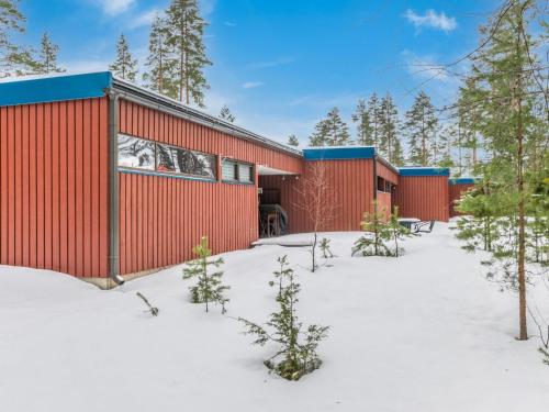 a row of shipping containers in the snow at Holiday Home Joutiainen l 69 in Hara