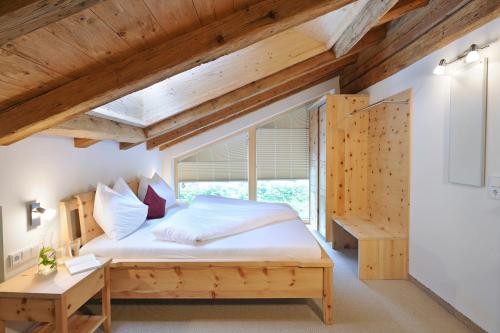 Ένα ή περισσότερα κρεβάτια σε δωμάτιο στο UR-NATUR Appartements