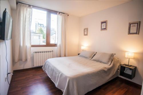 Кровать или кровати в номере La Catedral