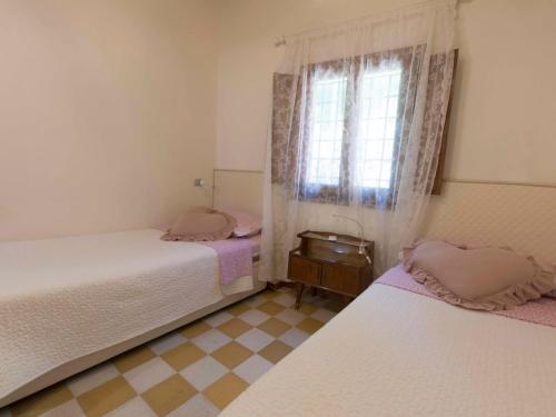 Postel nebo postele na pokoji v ubytování Holiday Home Colle alla luna by Interhome