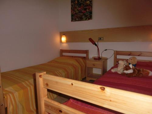 A bed or beds in a room at Villa with garden parking and AC