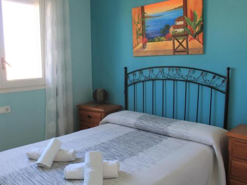 Posteľ alebo postele v izbe v ubytovaní Suitur casa baquera en la playa larga roda de bará