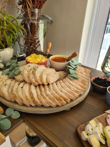 a large plate of food on a table at Cape Winelands Business Villas in Joostenberg Vlakte