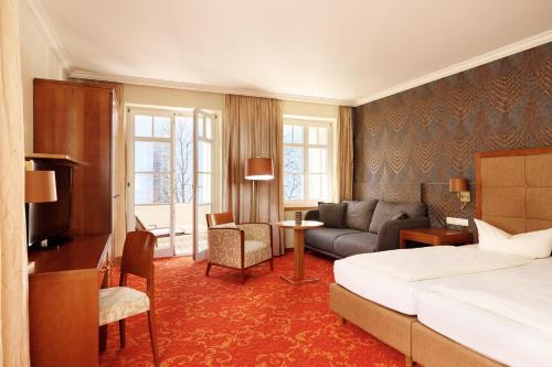 Postel nebo postele na pokoji v ubytování Hotel Mohren