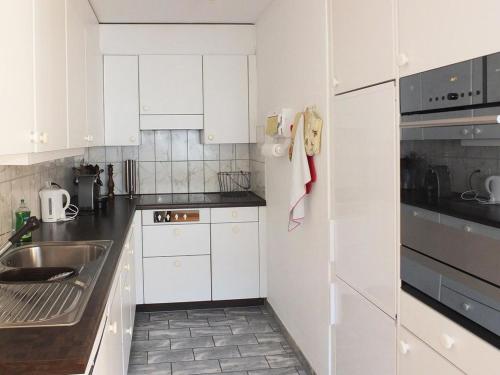 Kuchyň nebo kuchyňský kout v ubytování Apartment Dorfstrasse 53a - 2 by Interhome