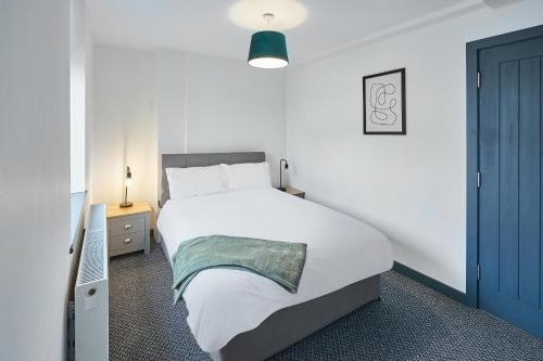 Uma cama ou camas num quarto em Host & Stay - Alma
