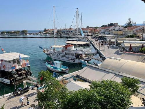 a group of boats docked at a marina at Aegean Blu Port House Pythagoreio in Pythagoreio
