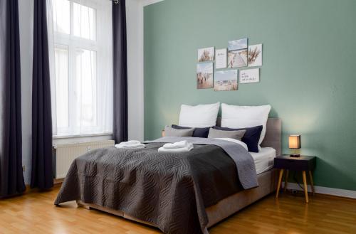 Cama ou camas em um quarto em JeyFL Apartments: stilvoll-modern-geräumig-ruhig