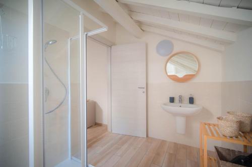 a bathroom with a shower and a sink at Comonfive Apartments in Como