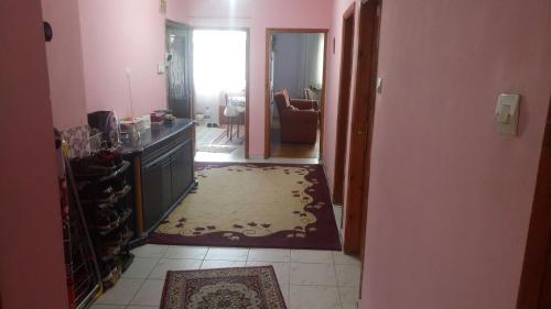 a hallway with a kitchen and a living room at Private Room in Istanbul #62 in Istanbul