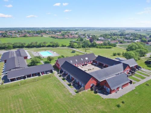 an aerial view of a large house with a yard at Apartment Gisella - 6km from the sea in Bornholm by Interhome in Åkirkeby