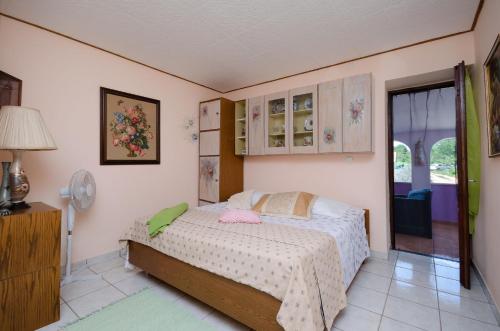 Postel nebo postele na pokoji v ubytování House Rita