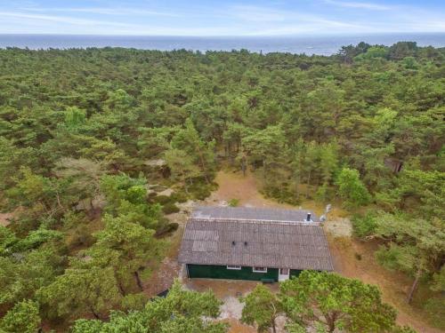 an overhead view of a house in the middle of a forest at Holiday Home Michel - 300m from the sea in Bornholm by Interhome in Vester Sømarken