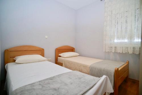 Säng eller sängar i ett rum på Trogir-Luxury Villa Sapphirus
