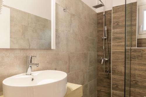 Kúpeľňa v ubytovaní POSEIDON SeaSide Deluxe Suites