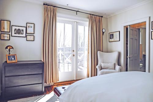 Postel nebo postele na pokoji v ubytování Hotel Fauchere