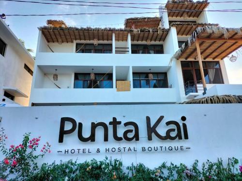 a sign for a hotel and hospital building at Punta Kai Hotel & Hostal in Puerto Escondido