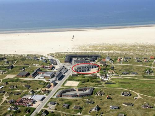 an aerial view of a building next to the beach at Apartment Iliane - 100m from the sea in Western Jutland by Interhome in Fanø
