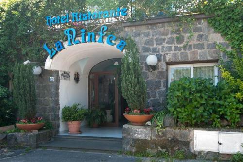 a building with a sign that reads private residence of a ranger at Hotel La Ninfea in Ischia