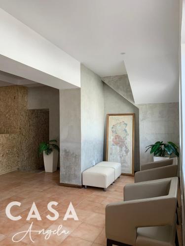 Гостиная зона в Residencial Casa Ângela