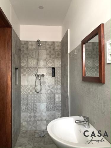 Ванная комната в Residencial Casa Ângela