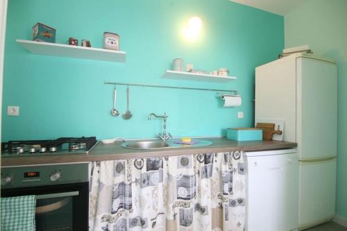 Kuchyňa alebo kuchynka v ubytovaní Apartment Providenca