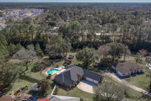 an aerial view of a house with a swimming pool at Sunset Pass in Middleburg