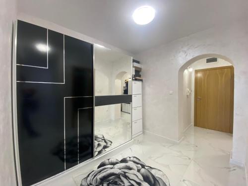 a bathroom with a walk in shower and a glass door at ANITA B19 LUXORY Apartment Sunny Beach in Sunny Beach