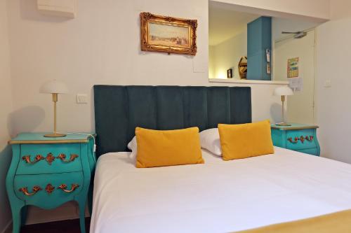 Katil atau katil-katil dalam bilik di Hotel Les Pasteliers