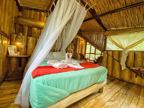 Кровать или кровати в номере Eco Quechua Lodge