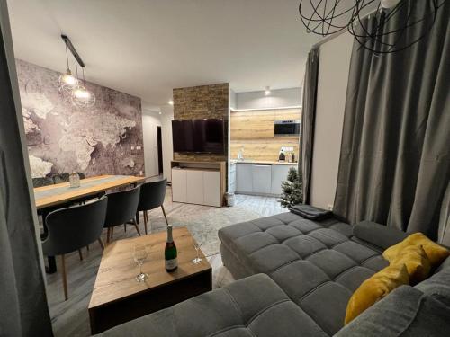 A kitchen or kitchenette at LUX apartmany Romantika CHOPOK 7, 19