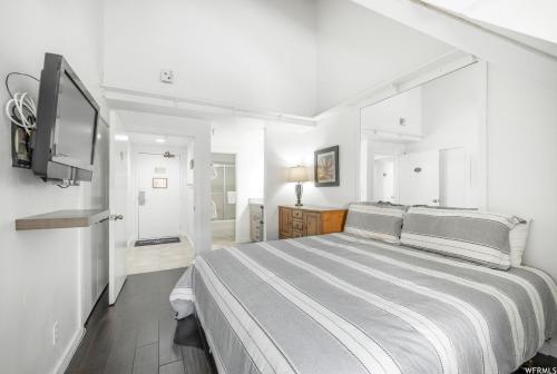 Ένα ή περισσότερα κρεβάτια σε δωμάτιο στο Lodge at Mountain Village 303 condo