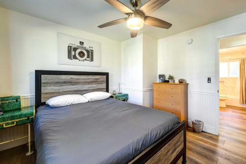 a bedroom with a bed and a ceiling fan at Dog-Friendly Oakhurst Home Walk to Downtown! in Oakhurst