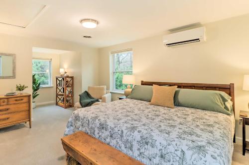 a bedroom with a bed and a desk and a chair at Blakeslee Home with Private Hot Tub, 5 Mi to Skiing! in Blakeslee