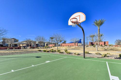 a basketball hoop on top of a tennis court at Patio and Balcony Spacious Gilbert Getaway! in Gilbert