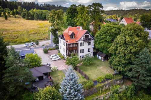 an aerial view of a house with a christmas tree at Willa Kwiaty Polskie in Jedlina-Zdrój