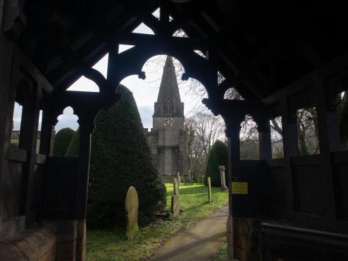 a view of a church with a clock tower at The Beeches - Chatsworth Apartment No 2 - Sleeps 4 in Baslow