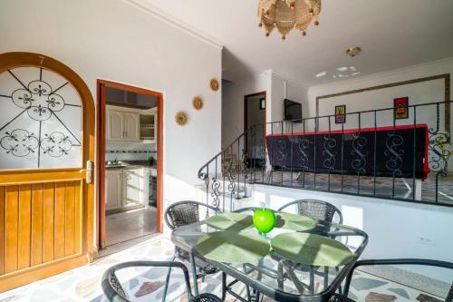 a dining room with a table and chairs at Hotel Cabañas Villa Roca, Rodadero in Santa Marta