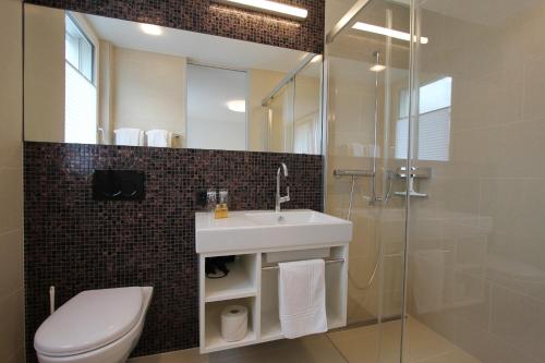 Koupelna v ubytování Hotel Flawil
