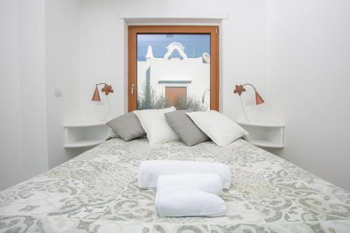 Katil atau katil-katil dalam bilik di Le Gemme Guest House