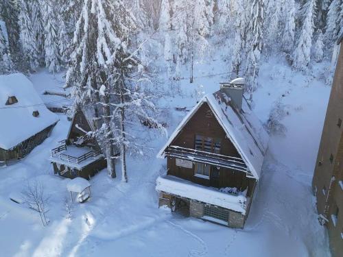 an aerial view of a cabin in the snow at KOTA - Prime Location in Jahorina