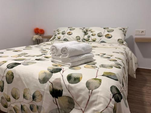 Postel nebo postele na pokoji v ubytování Acogedor Apartamento cerca de la playa