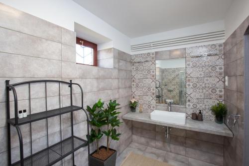 Ένα μπάνιο στο Deres Apartmanház