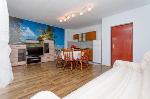 Kuchyň nebo kuchyňský kout v ubytování Apartments Mladen