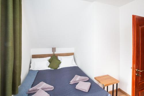 Ένα ή περισσότερα κρεβάτια σε δωμάτιο στο Deres Apartmanház
